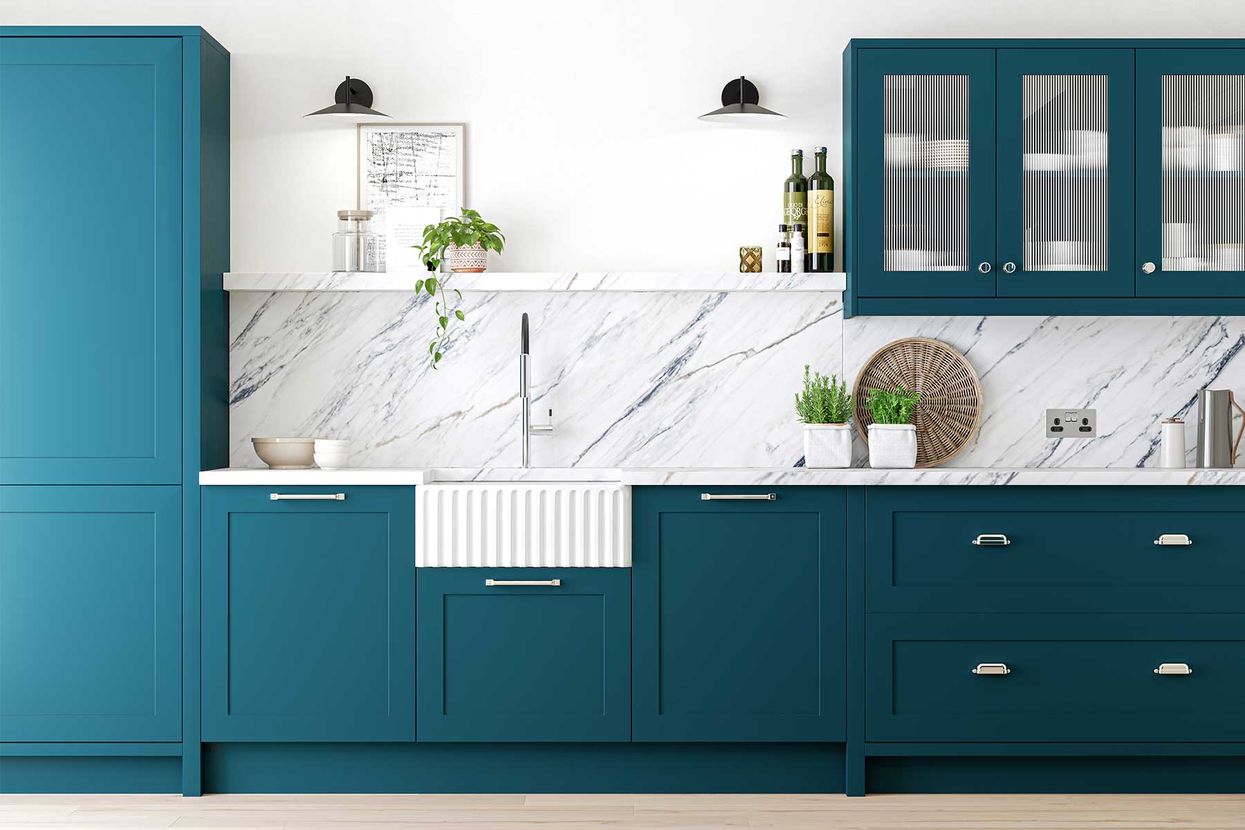 Hartfield galley kitchen in rich Majestic Teal with white marble effect quartz worktops from Claremont Kitchens